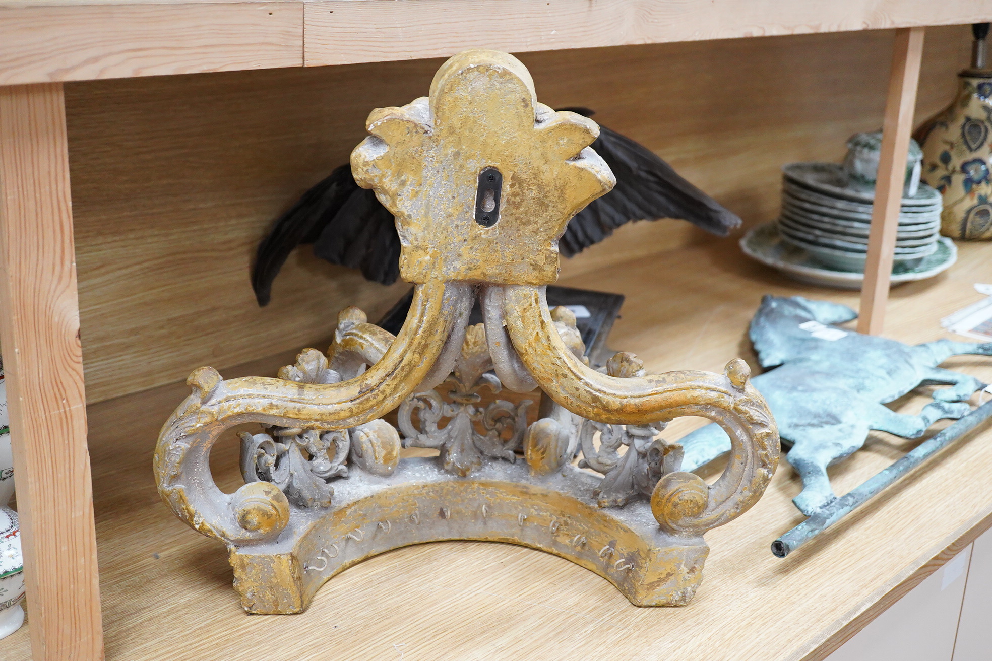 A large gilt painted composition coronet shaped bed canopy, 46cm high